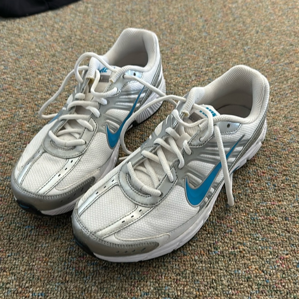 Like new white and blue Nikes